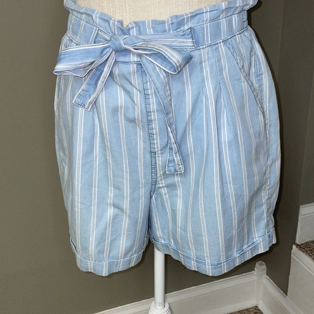 Lovely blue and white pinstripe size medium paper bag waist shorts with pockets.